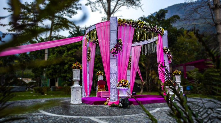 Resort cottages and lawn near Jim Corbett, suitable for a destination wedding